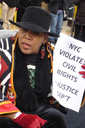 photo of a female demonstrator in a wheelchair